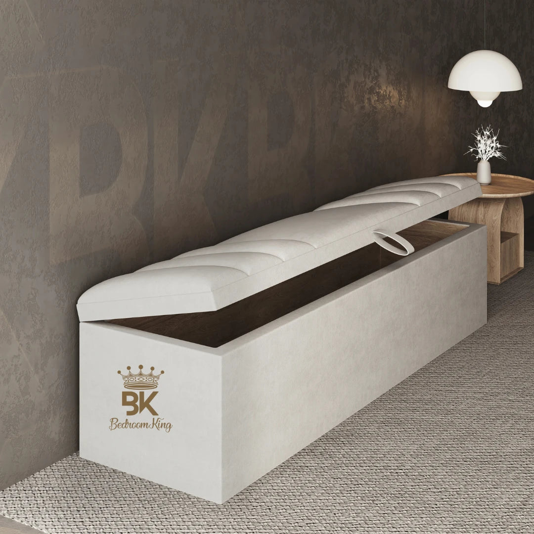 White storage bench with 'Bedroom King' logo in a room setting.