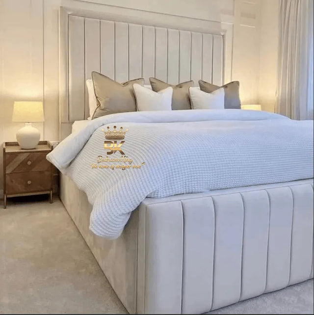 Jade upholstered bed frame with high side panels in a modern bedroom